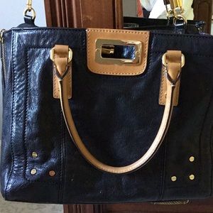 Black leather handbag by Milly